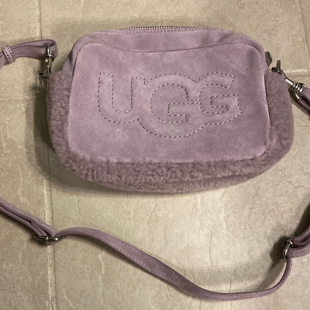 Purple Ugg mini bag with soft exterior. Brand new without tags.